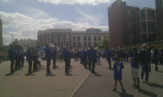 brass band outside Stamford Bridge
