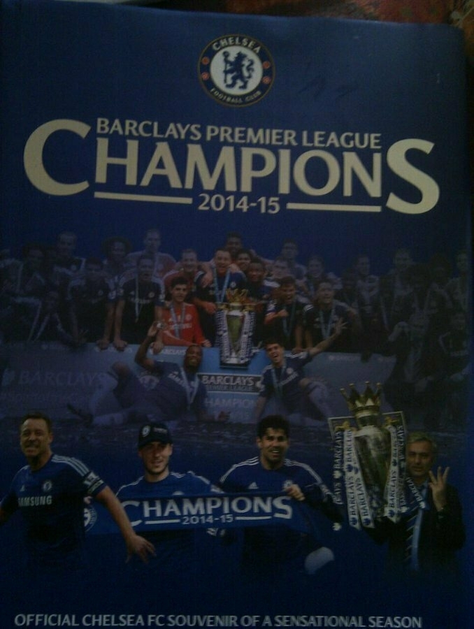 Auto-generated description: A poster commemorates Chelsea FC as the 2014-15 Barclays Premier League champions, featuring team members and the trophy.