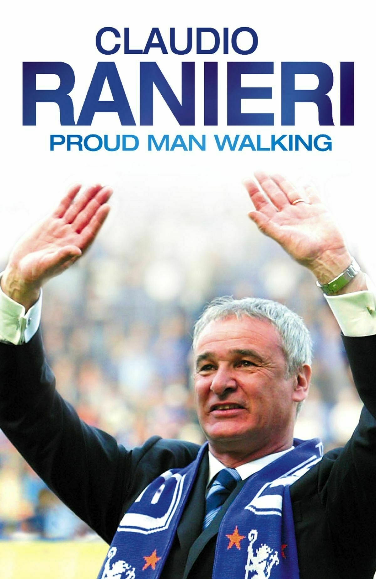 Auto-generated description: A man in a suit and scarf raises his hands in celebration beneath bold text reading Claudio Ranieri Proud Man Walking.